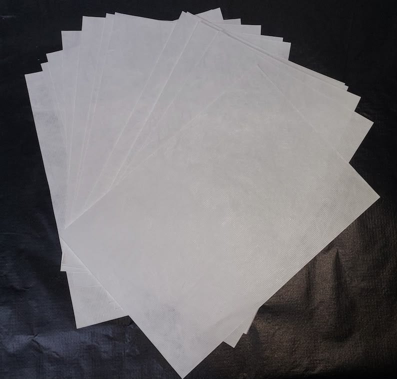Cannabinoid C-Liquid Spray on Paper