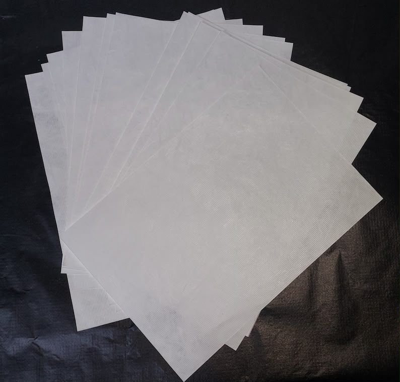 Cannabinoid C-Liquid Spray on Paper